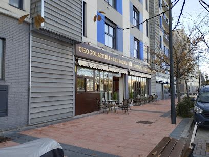 Tacita de Plata: Chocolatería y Churrería